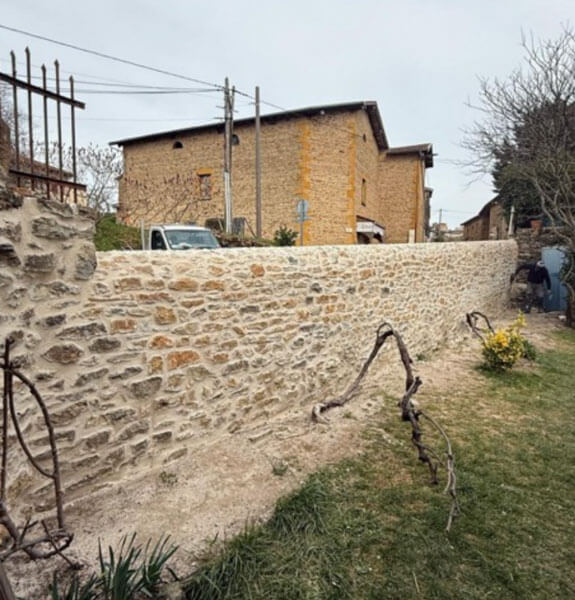 mur de pierre lca construction